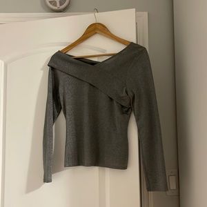 Grey shiny top ideal for a New Year celebration